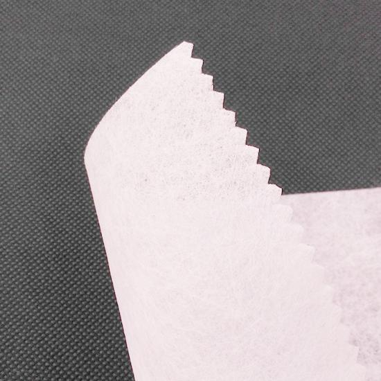 Polyester stitch bonded nonwoven fabrics